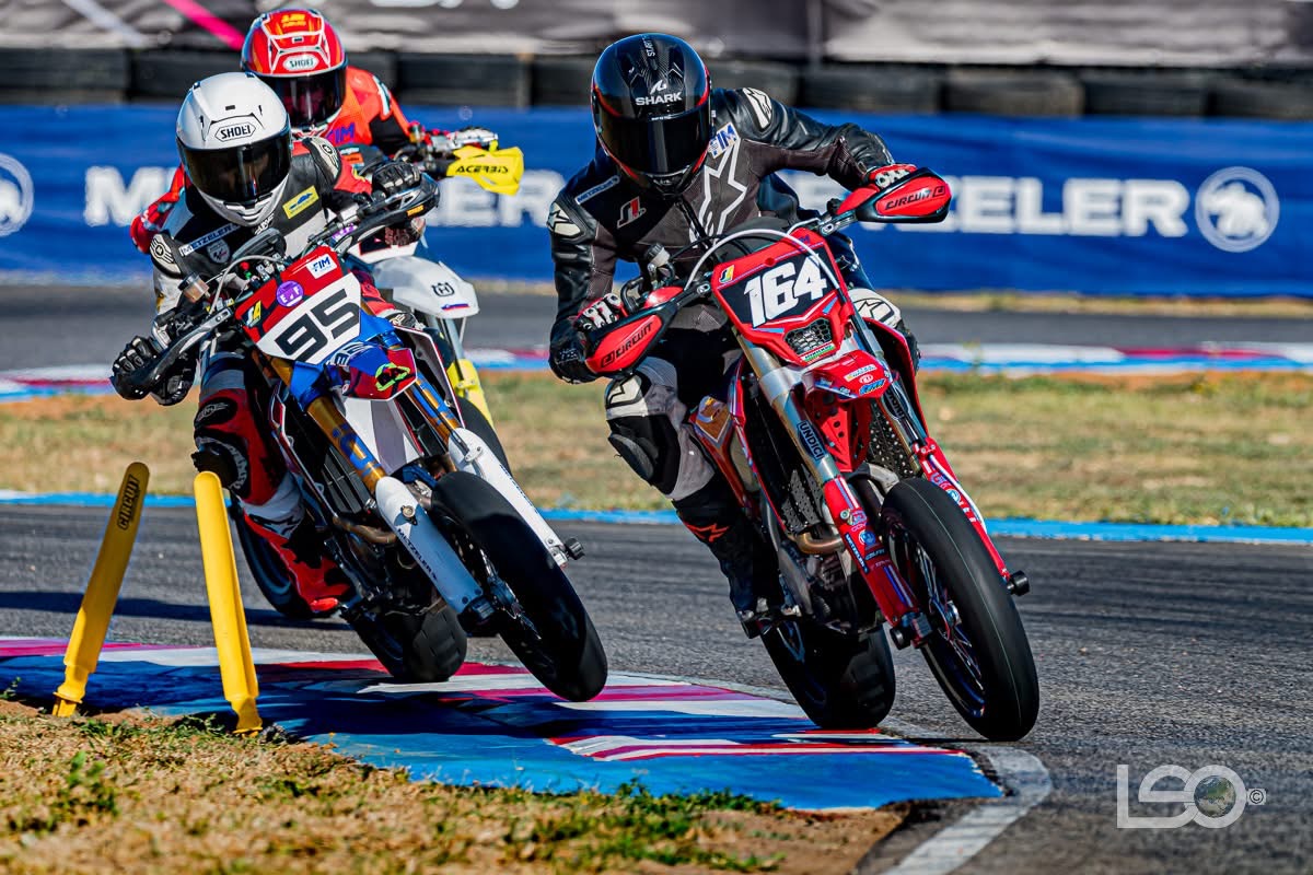 Supermoto riders on the track
